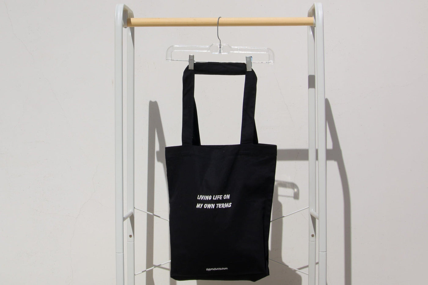 Tote in black: "Living life on my own terms".