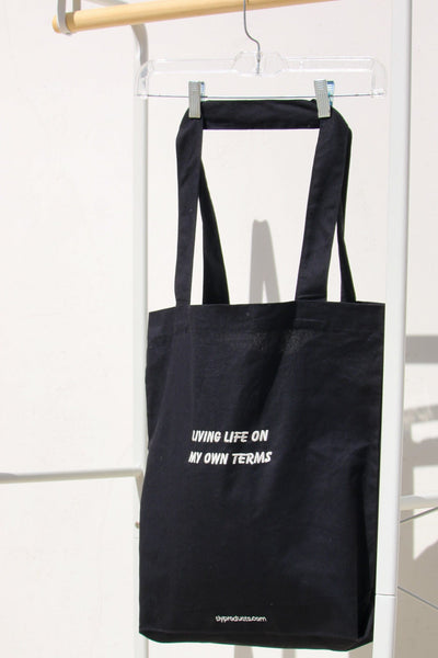 Tote in black: "Living life on my own terms".